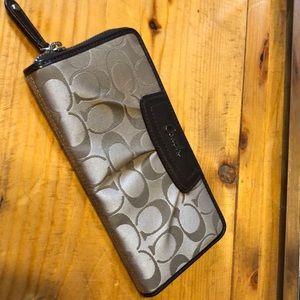 Authentic coach zippered large wallet.